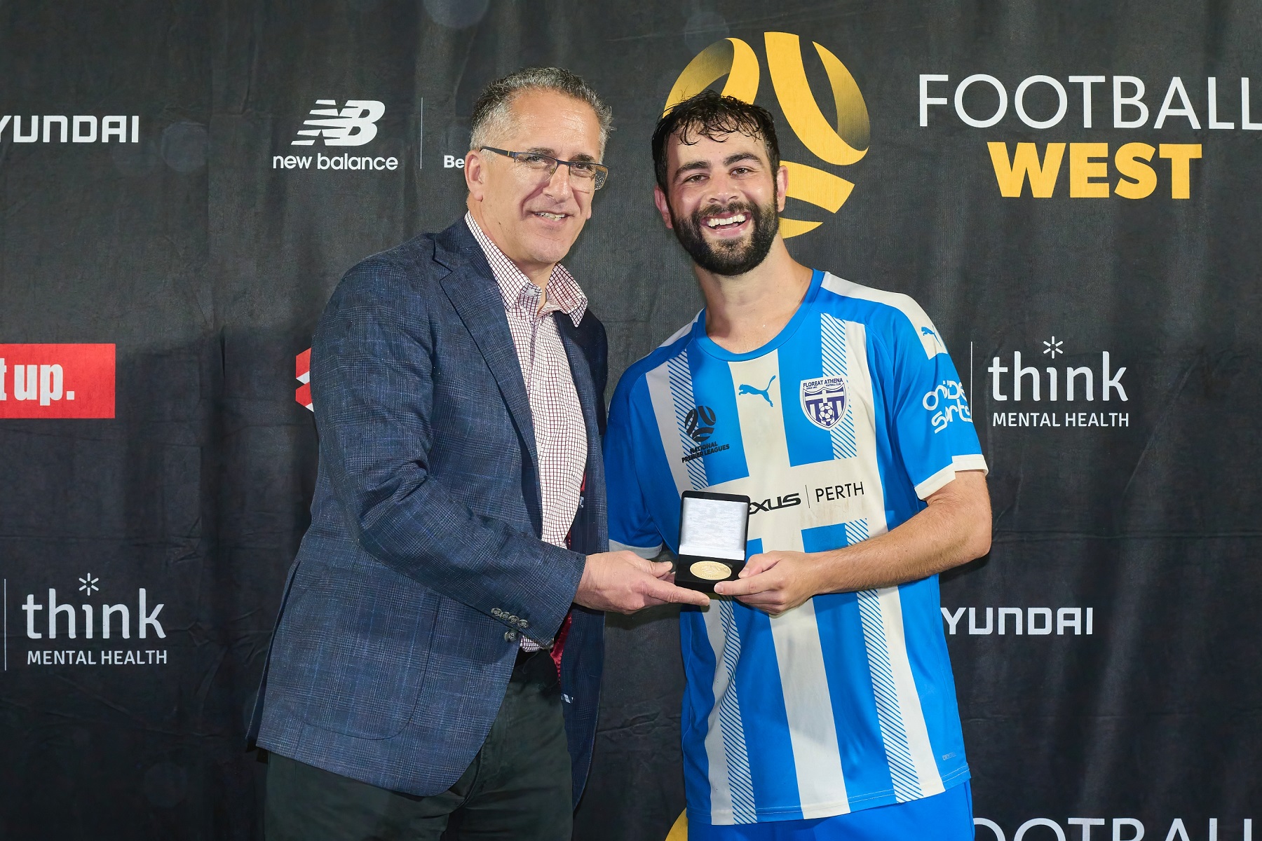 Stan LAzaridis Medal winner Nick Ambrogio with Football West chairman Sherif Andrawes. Photo by Football West/Fotoenzo